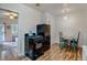 Retro kitchen with black appliances and a small dining table at 2660 Utica St, Denver, CO 80212