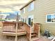 Spacious deck with seating area and stairs at 12578 Dexter Way, Thornton, CO 80241