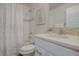 Clean bathroom with a shower/tub combo and updated vanity at 5863 N Boston St, Denver, CO 80238