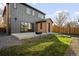 Modern home with backyard patio, fire pit, and detached garage at 2381 S Franklin St, Denver, CO 80210