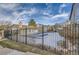 View of fenced-in community pool area at 3464 S Eagle St # 201, Aurora, CO 80014