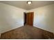 Bright bedroom with double door closet and neutral carpeting at 476 Zion St, Aurora, CO 80011