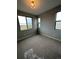 Bright bedroom with neutral walls and carpet, offering ample natural light at 27472 E 1St Ave, Aurora, CO 80018