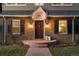 Inviting front entrance with brick facade and wood door at 1126 3Rd Ave, Longmont, CO 80501