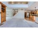 Two-story living room with open floor plan and hardwood floors at 10803 W Coco Pl, Littleton, CO 80127