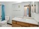 Clean bathroom with wood vanity and a shower/tub at 10251 W 44Th Ave # 6-202, Wheat Ridge, CO 80033