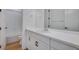 Modern bathroom with white vanity and a bathtub at 3452 N Gold Bug Ct, Aurora, CO 80019