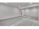 Finished basement with grey carpet and recessed lighting at 3452 N Gold Bug Ct, Aurora, CO 80019