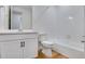 Clean bathroom with white vanity, bathtub, and toilet at 3452 N Gold Bug Ct, Aurora, CO 80019