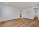 Spacious bedroom with hardwood floors and access to a bathroom at 3452 N Gold Bug Ct, Aurora, CO 80019