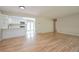 Spacious living room with hardwood floors and open kitchen view at 2866 E Euclid Pl, Centennial, CO 80121