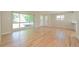 Living room with hardwood floors and access to kitchen at 2866 E Euclid Pl, Centennial, CO 80121