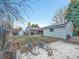 Large backyard with shed, garden, and detached garage at 6765 S Adams Way, Centennial, CO 80122