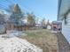 Large backyard with shed, garden, and detached garage at 6765 S Adams Way, Centennial, CO 80122