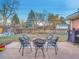 Large backyard with firepit, patio, and ample green space at 6765 S Adams Way, Centennial, CO 80122