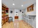 Finished basement recreation area with bar and shelving at 6765 S Adams Way, Centennial, CO 80122