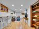 Spacious finished basement with sitting area and bar at 6765 S Adams Way, Centennial, CO 80122