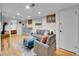 Finished basement with a comfortable sitting area and bar at 6765 S Adams Way, Centennial, CO 80122