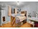 Cozy bedroom with built-in storage and a full-size bed at 6765 S Adams Way, Centennial, CO 80122