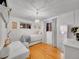 Charming bedroom featuring hardwood floors and a twin bed at 6765 S Adams Way, Centennial, CO 80122