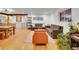 Open living and dining area with hardwood floors and modern decor at 6765 S Adams Way, Centennial, CO 80122