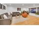 Spacious living room with hardwood floors and large windows at 6765 S Adams Way, Centennial, CO 80122