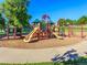 playground with swings, slides, and climbing equipment at 6765 S Adams Way, Centennial, CO 80122