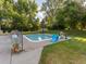 Smaller pool with a slide and play area for young children at 6765 S Adams Way, Centennial, CO 80122