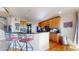 Spacious kitchen with granite countertops and wood cabinets at 11416 Newport St, Thornton, CO 80233