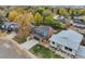 Aerial view of a residential neighborhood showcasing a brick home at 7313 S Teller Ct, Littleton, CO 80128