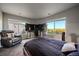 Bedroom with a view and comfortable seating at 5562 Rim View Pl, Parker, CO 80134