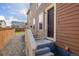 Backyard with gravel pathway and wooden fence at 2804 E 162Nd Dr, Thornton, CO 80602