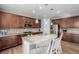 Kitchen with granite countertops and wooden cabinets at 2804 E 162Nd Dr, Thornton, CO 80602