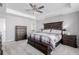 Spacious main bedroom with large bed and dark wood furniture at 2804 E 162Nd Dr, Thornton, CO 80602