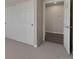 Spacious bedroom with double sliding doors and an adjacent storage room at 875 E 78Th Ave # 67, Denver, CO 80229