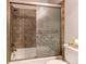 Shower and bathtub with tile surround at 2790 S Wheeling Way, Aurora, CO 80014