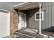 House exterior with gray siding and stone accents at 2790 S Wheeling Way, Aurora, CO 80014