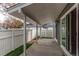 Covered patio with access to a fenced backyard at 2790 S Wheeling Way, Aurora, CO 80014