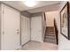 Entryway with staircase, closet and light grey walls at 2790 S Wheeling Way, Aurora, CO 80014