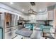 Modern kitchen with stainless steel appliances and an island at 2790 S Wheeling Way, Aurora, CO 80014