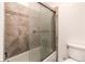 Modern bathroom with a large shower and updated tile at 2790 S Wheeling Way, Aurora, CO 80014