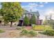 Two-story house with a charming front porch and well-maintained landscaping at 3728 N Quitman St, Denver, CO 80212