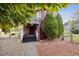 Welcoming front entrance with stairs and a quaint sitting area at 3728 N Quitman St, Denver, CO 80212