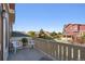 Private balcony with chairs and view of neighborhood at 18165 E Saskatoon Pl, Parker, CO 80134