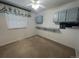 Bright bedroom with built-in cabinets and window coverings at 11132 E Harvard Dr, Aurora, CO 80014