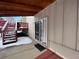 Covered patio, deck and stairs leading to backyard at 11132 E Harvard Dr, Aurora, CO 80014