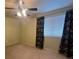 Bedroom with ceiling fan, window with blinds, and carpet flooring at 11132 E Harvard Dr, Aurora, CO 80014