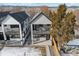 Aerial view of two modern townhouses with private yards and balconies at 2317 S Galapago St, Denver, CO 80223