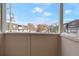 View from a patio overlooking a snow-covered courtyard at 3490 S Akron St # 4, Denver, CO 80231