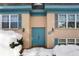 Building exterior showcasing a snow covered entrance at 3490 S Akron St # 4, Denver, CO 80231